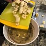 Adding the Bananas to the Bananas Foster sauce mixture, taken by Allspice Photography, LLC.