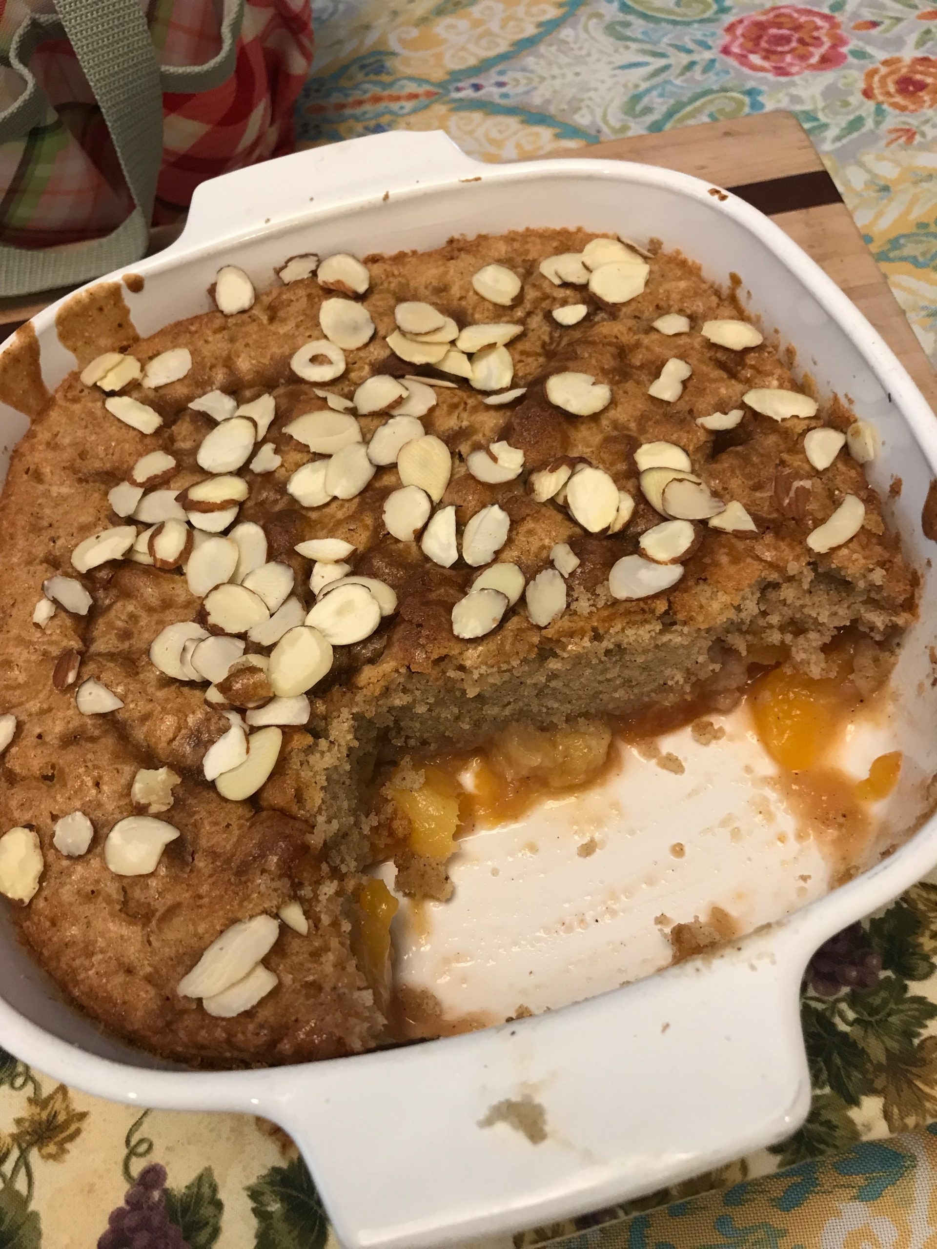 The finished Almond Peach Cobbler, taken by Allspice Photography, LLC.