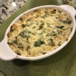 Our non-dairy spinach artichoke dip cooling out of the oven, taken by Allspice Photography, LLC.