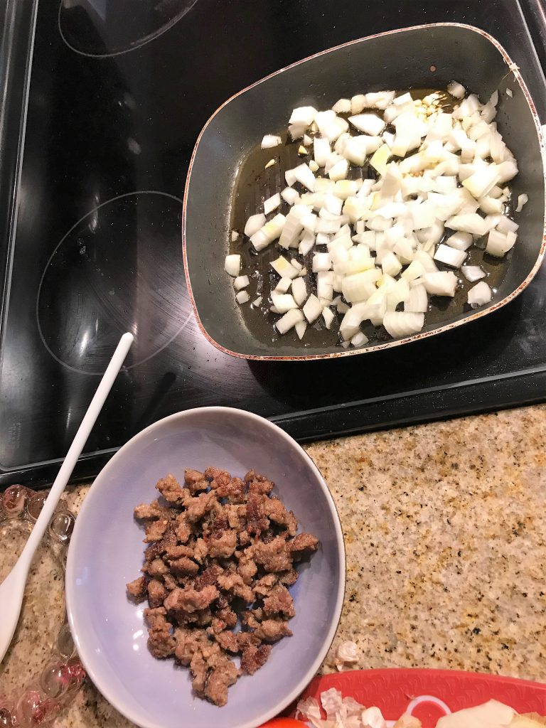 Sautéing the onions and beef for the freezer-prep breakfast burritos. Taken by Allspice Photography, LLC.
