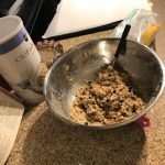 Mixing the chocolate chips and oatmeal into the cookie dough, taken by Allspice Photography, LLC.