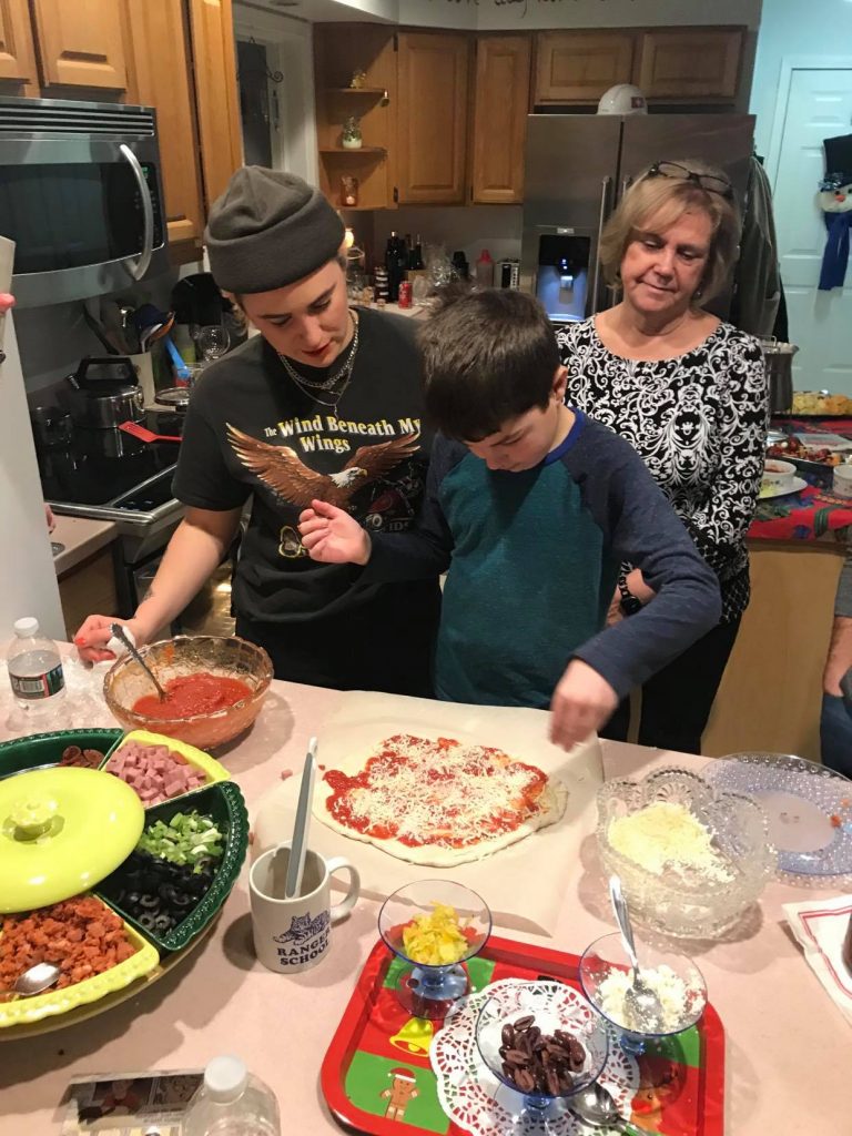 My cousins and aunt are pictured here at one of our "Make Your Own Pizza and Ice Cream Sundae" parties over the winter holiday!