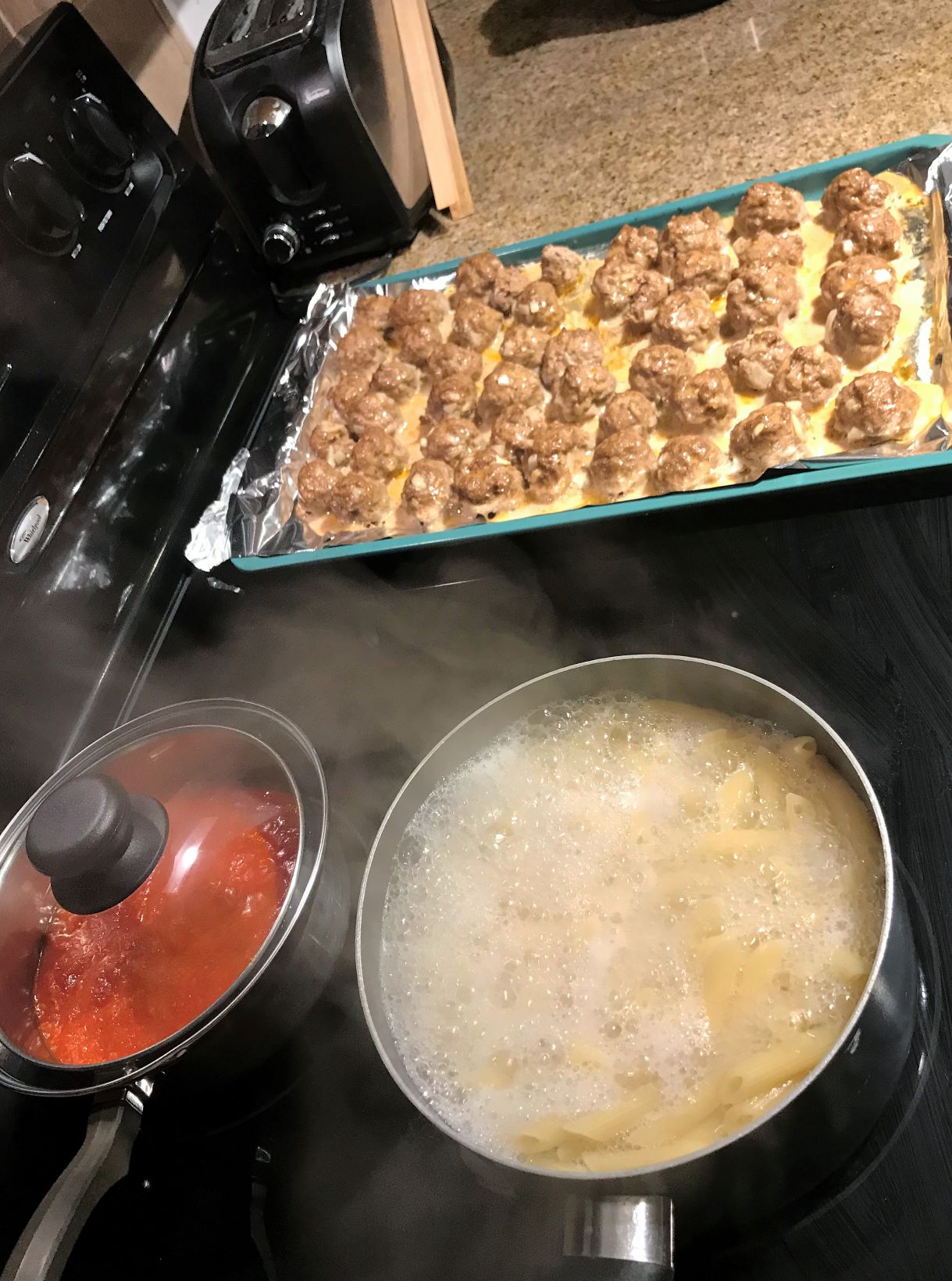 Making Mom's meatball recipe with pasta and sauce, taken by Allspice Photography, LLC.