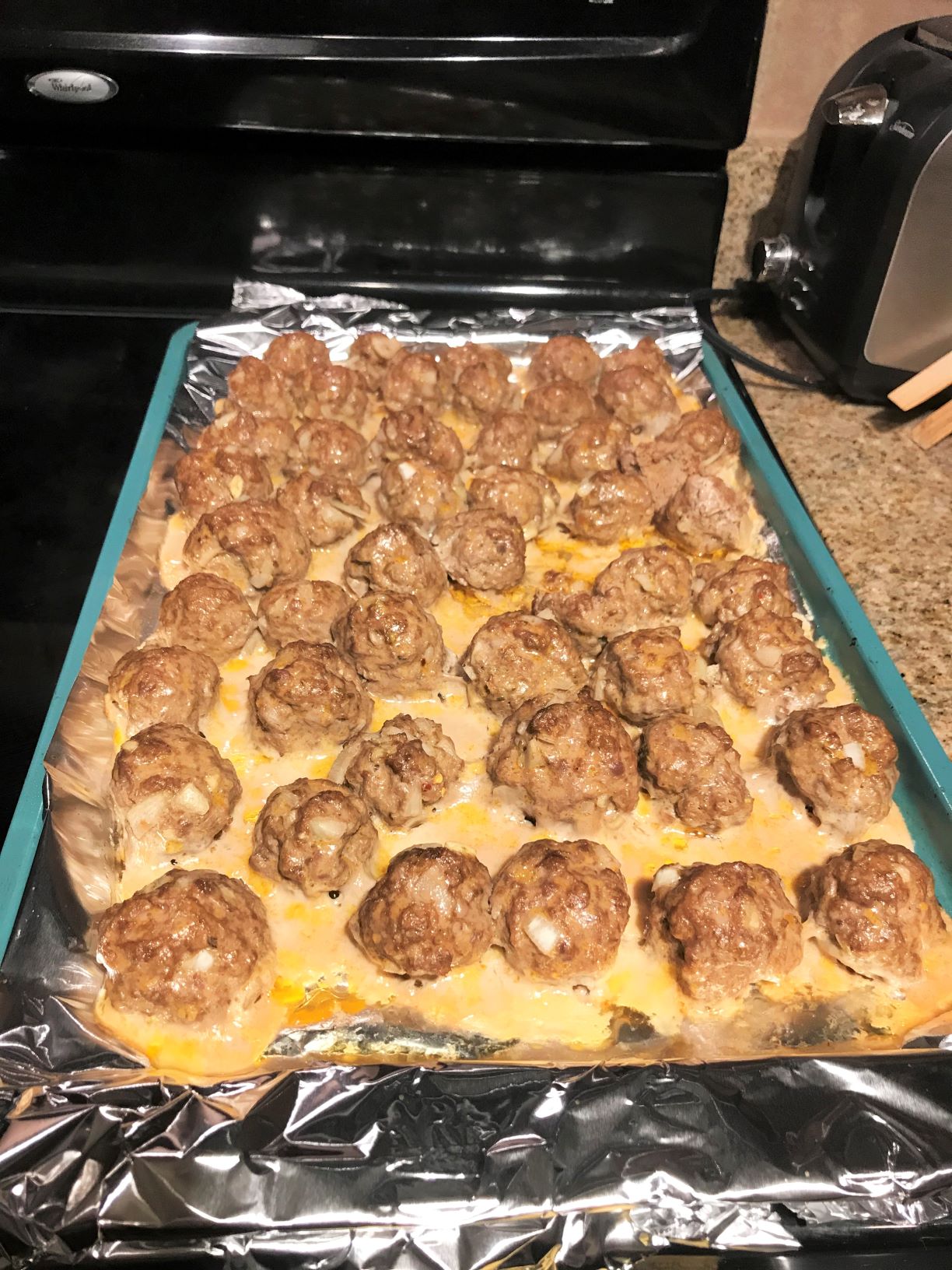 The meatballs fresh out of the oven, taken by Allspice Photography, LLC.