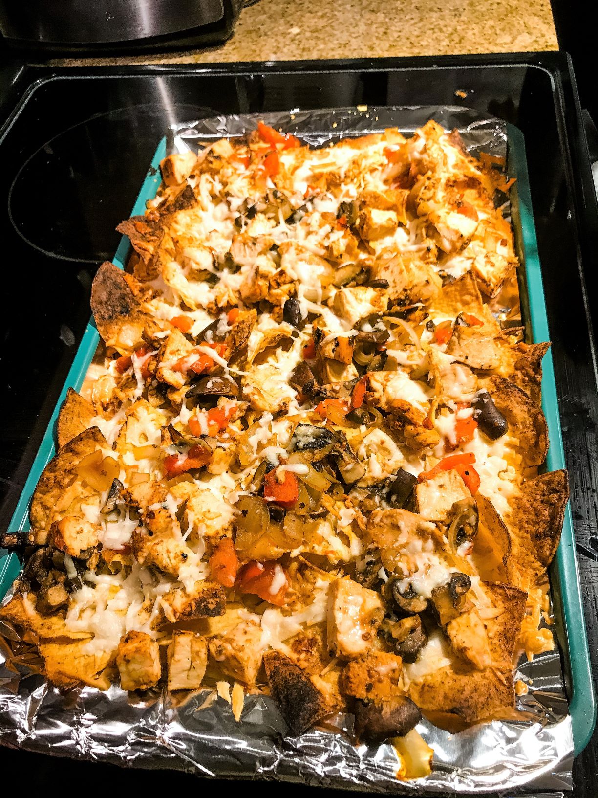 Finished version of the best nacho recipe, taken by Allspice Photography, LLC.