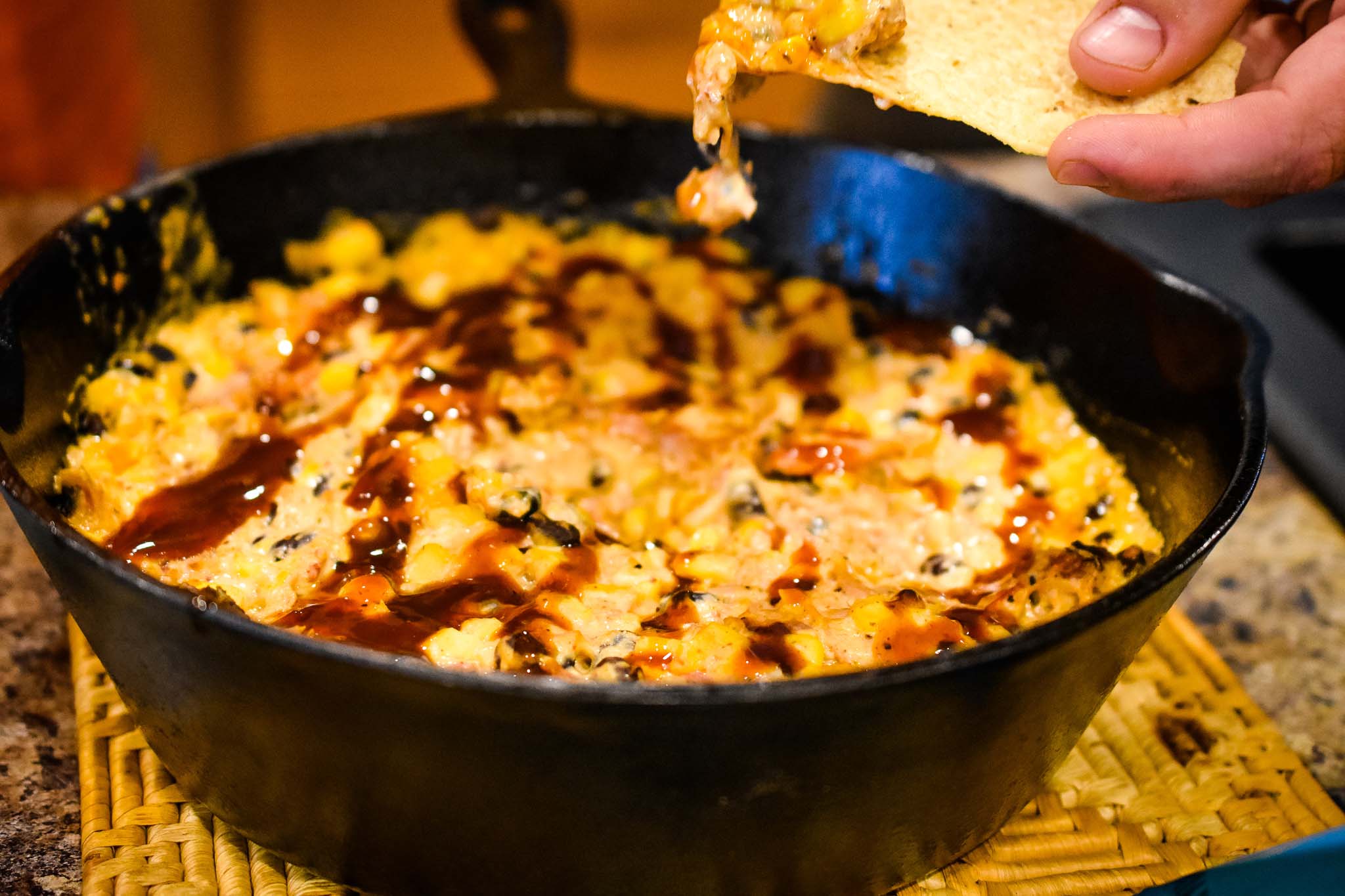 This Cheesy BBQ Pulled Pork dip was such a hit with my friends! Like Buffalo Chicken dip, but southern-ified!