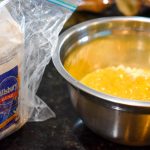 Mixing all the ingredients for the cornbread together, taken by Allspice Photography, LLC.