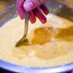 Mixing all the ingredients for the cornbread together, taken by Allspice Photography, LLC.