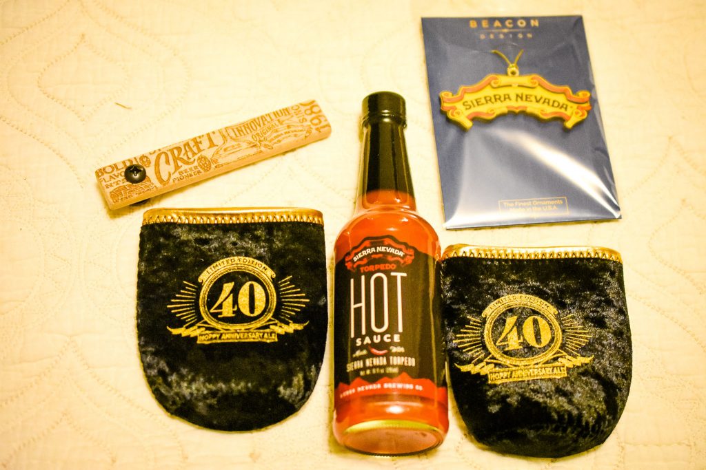 Jamie's other gifts (besides the beer) included - Torpedo IPA hot sauce, Sierra Nevada Christmas ornament, 40th anniversary velvet beer koozies, and a wooden beer opener.