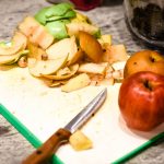 Cutting up fruit for the Easy no crust apple pie, taken by Allspice Photography, LLC.