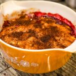 Taking the pie out of the oven, taken by Allspice Photography, LLC.