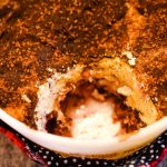 Cutting into the Easy No Crust Apple Pie, taken by Allspice Photography, LLC.