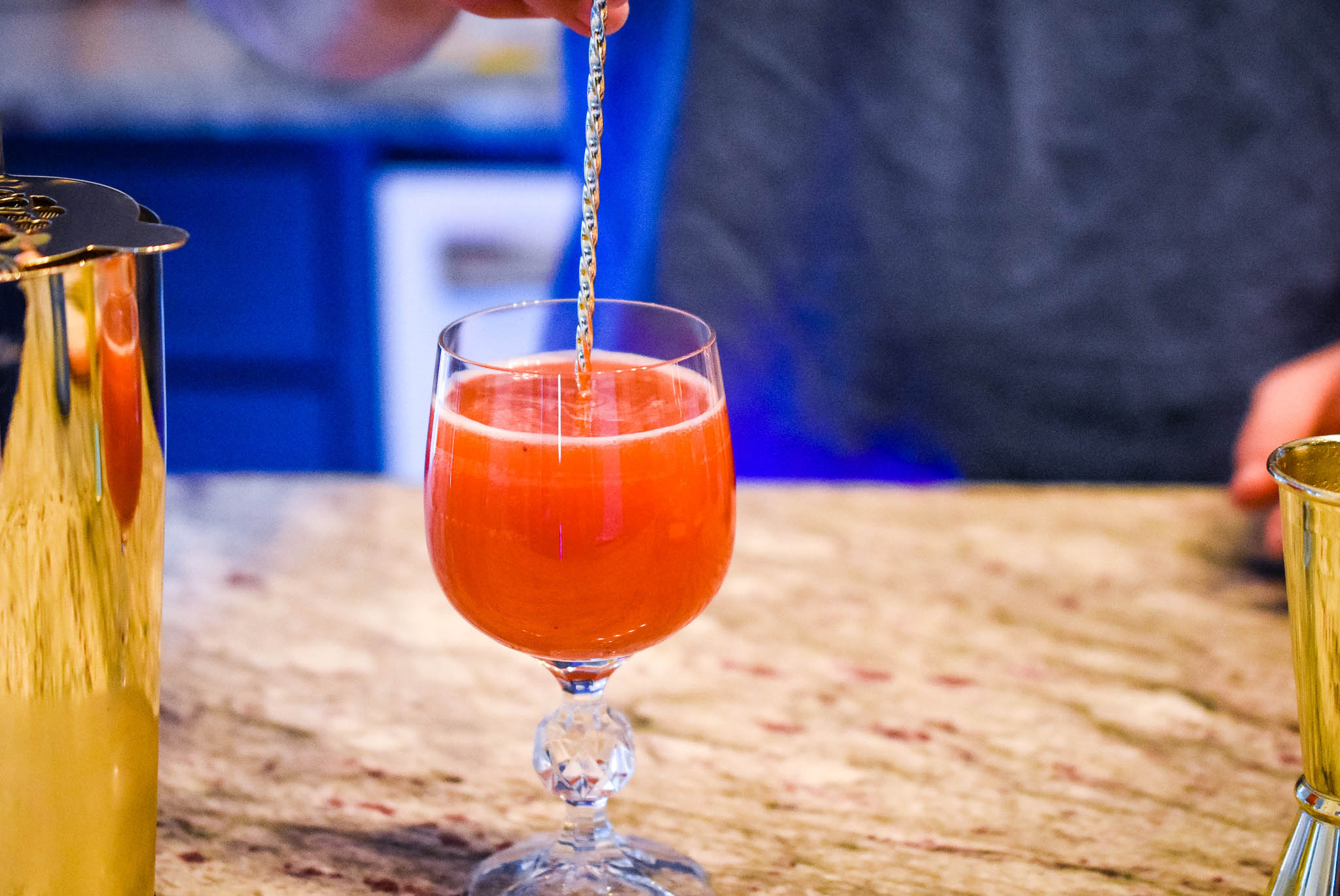 Stir the lemon sparkling water into the peach nectar and strawberry purée mixture gently as to not lose all the bubbles! Taken by Allspice Photography, LLC.