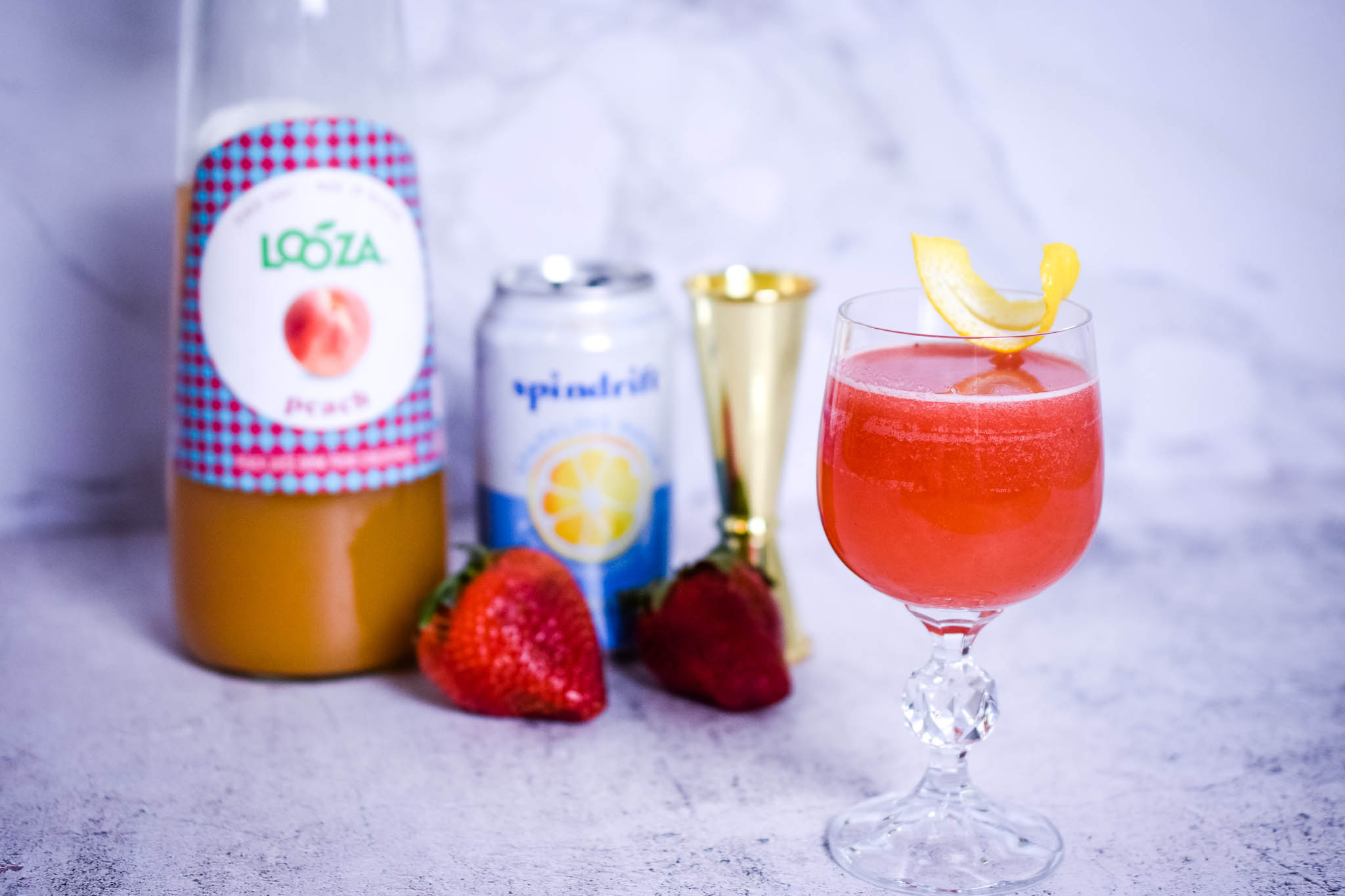 Our finished Summer Berry mocktail, created for the Moms on the Move Podcast in Greenville, SC. Taken by Allspice Photography, LLC.