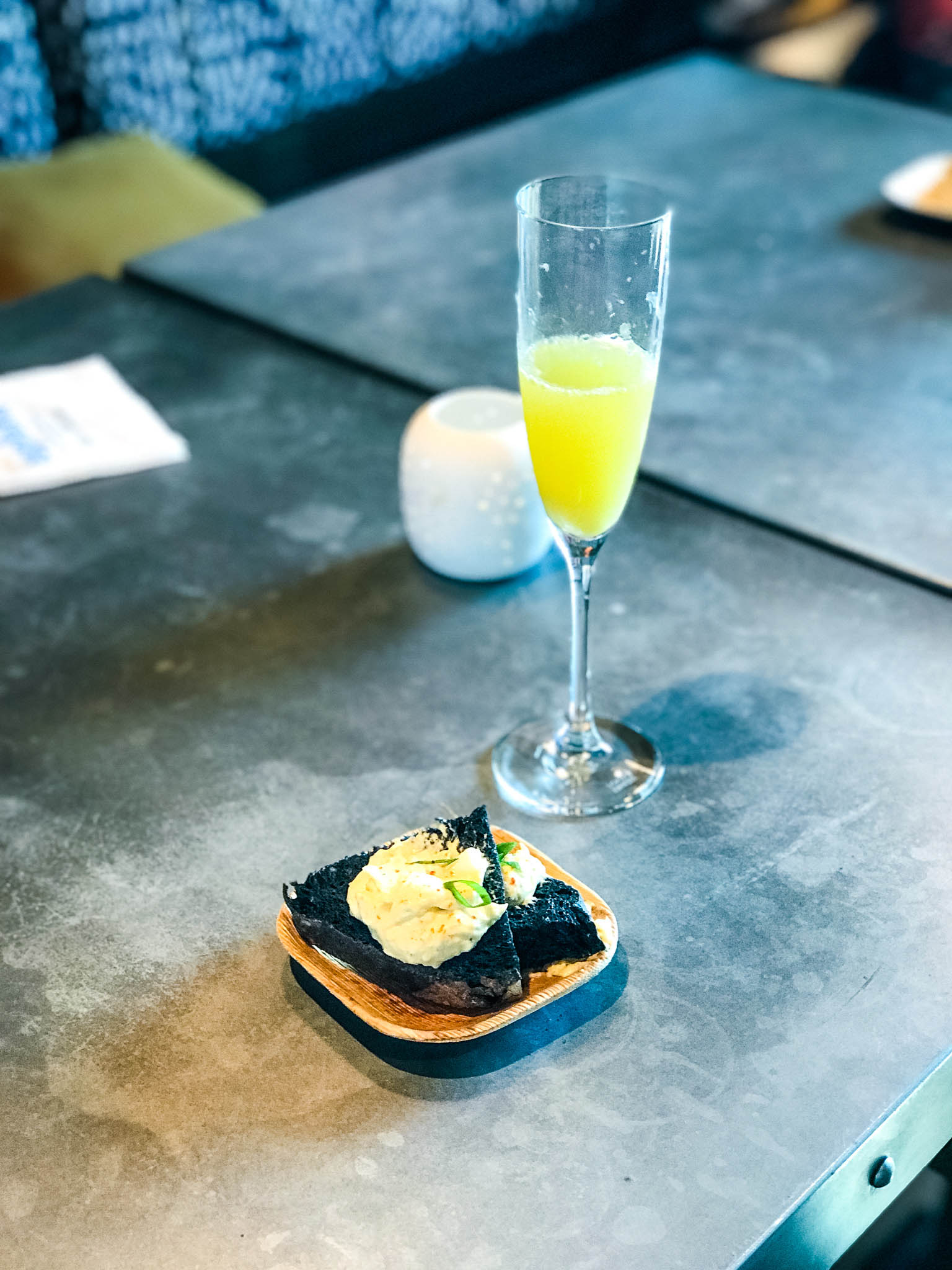 Charcoal bread and egg salad sandwich with mimosa from Nectar Farm Kitchen at Juniper in downtown Greenville, SC.