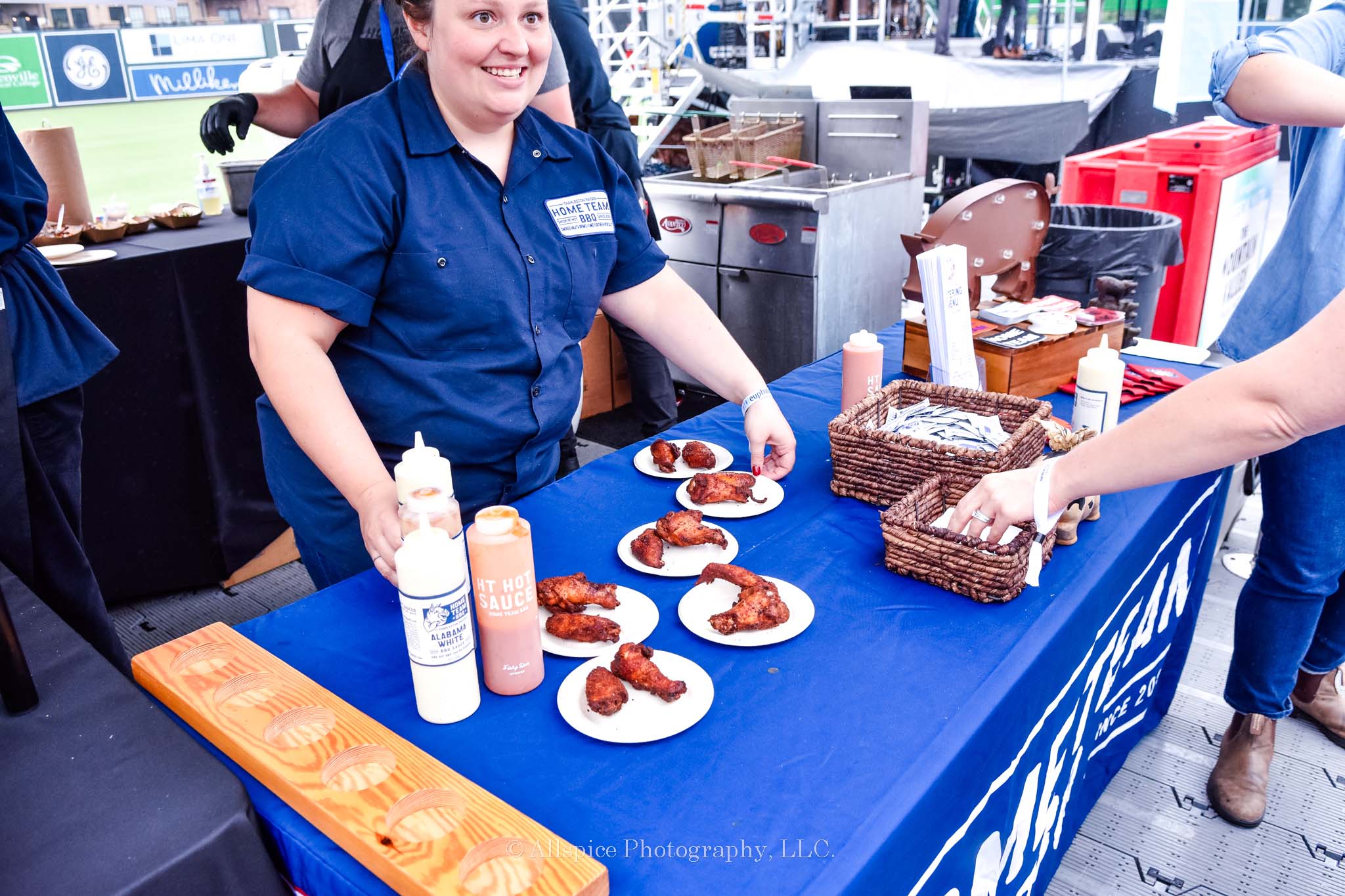 Home Team BBQ wings and booth from Feast by the Field, taken by Allspice Photography, LLC.