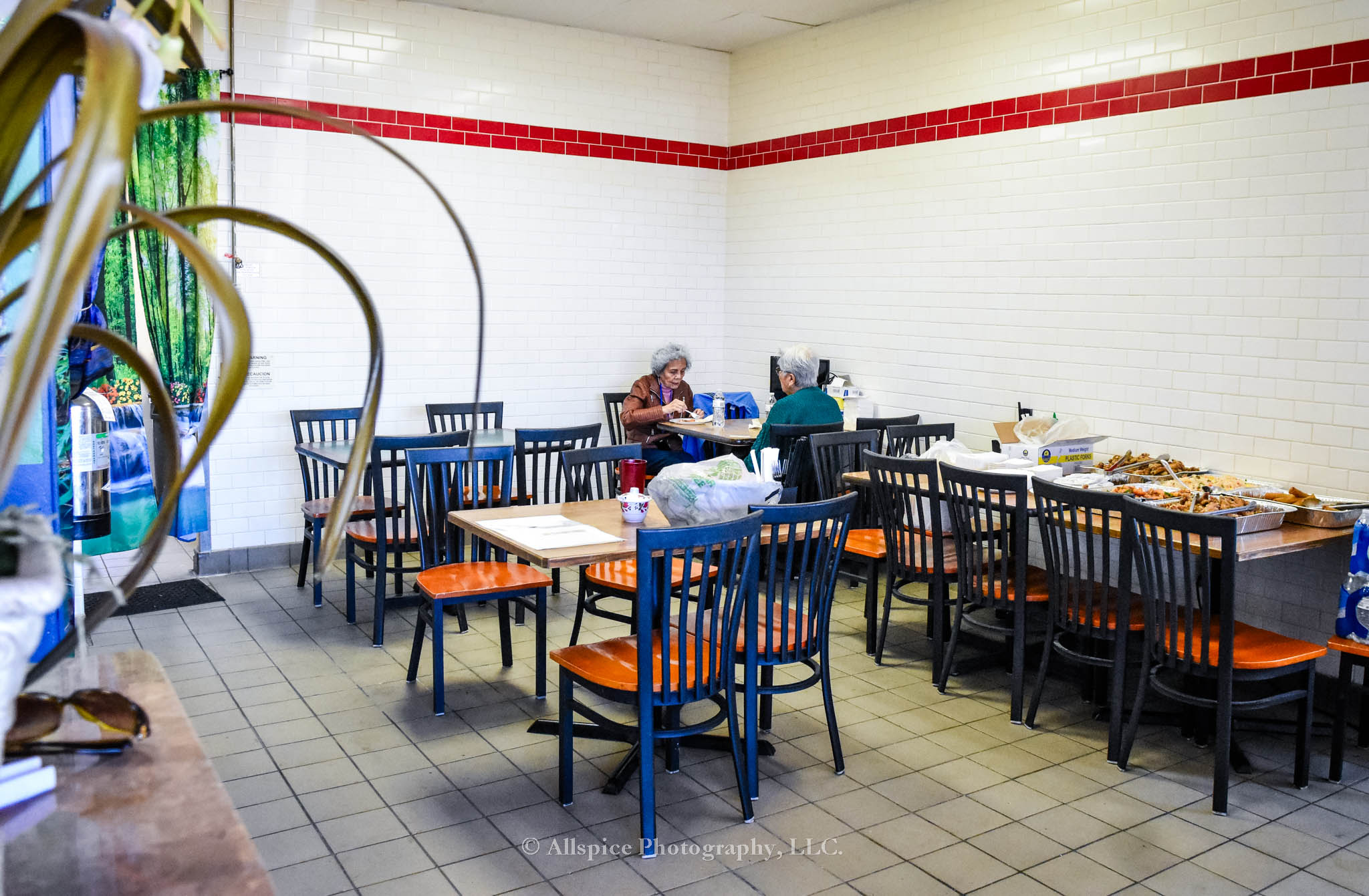 Diners enjoying their meal at Pho Luck! Restaurant in Wellford, SC, taken by Allspice Photography, LLC.
