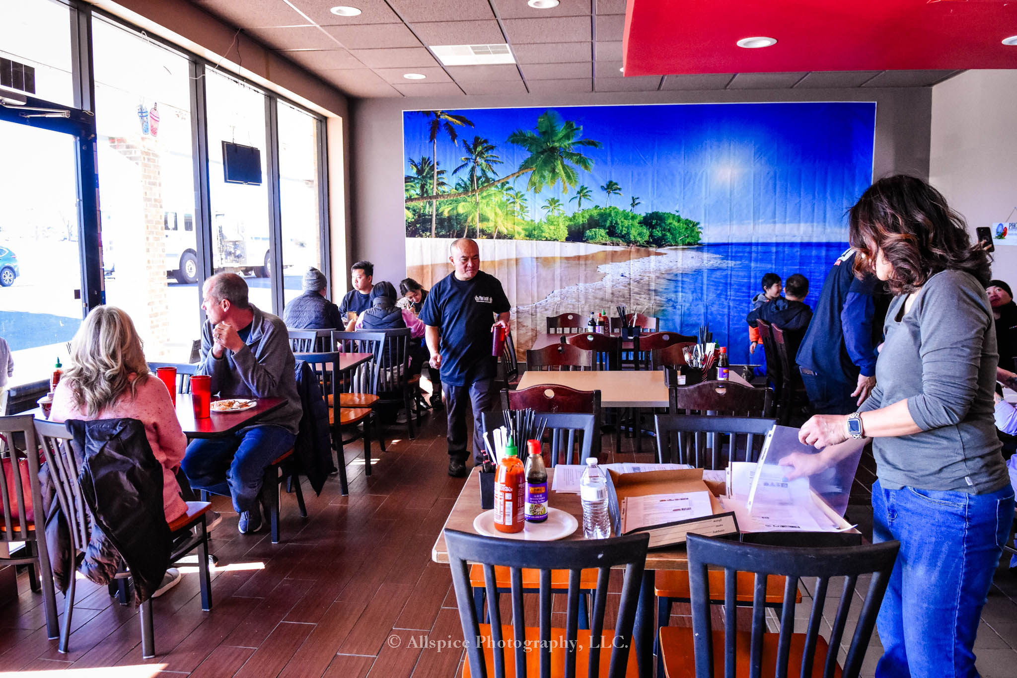 Diners enjoying their meal at Pho Luck! Restaurant in Wellford, SC, taken by Allspice Photography, LLC.