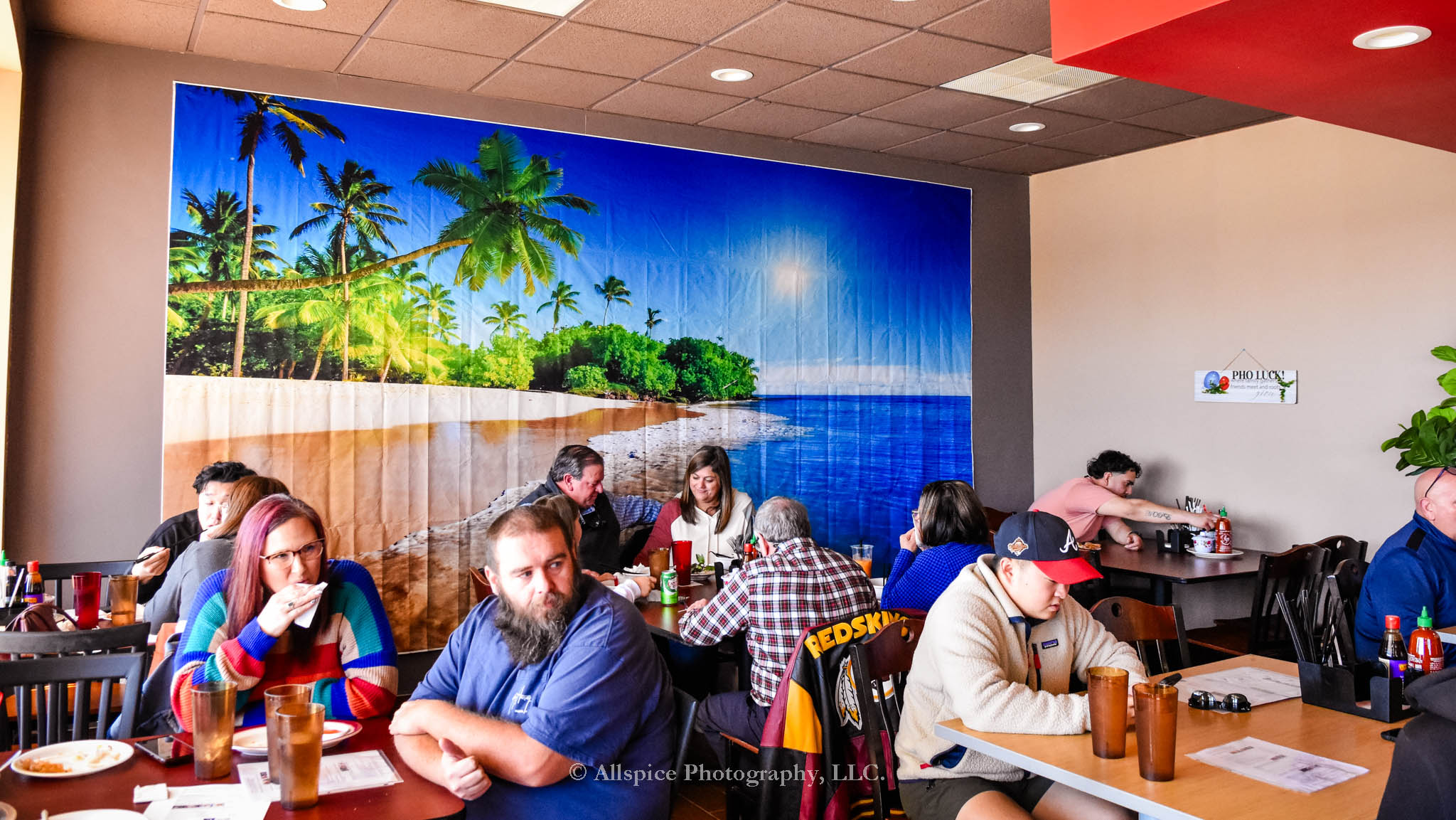 Diners enjoying their meal at Pho Luck! Restaurant in Wellford, SC, taken by Allspice Photography, LLC.
