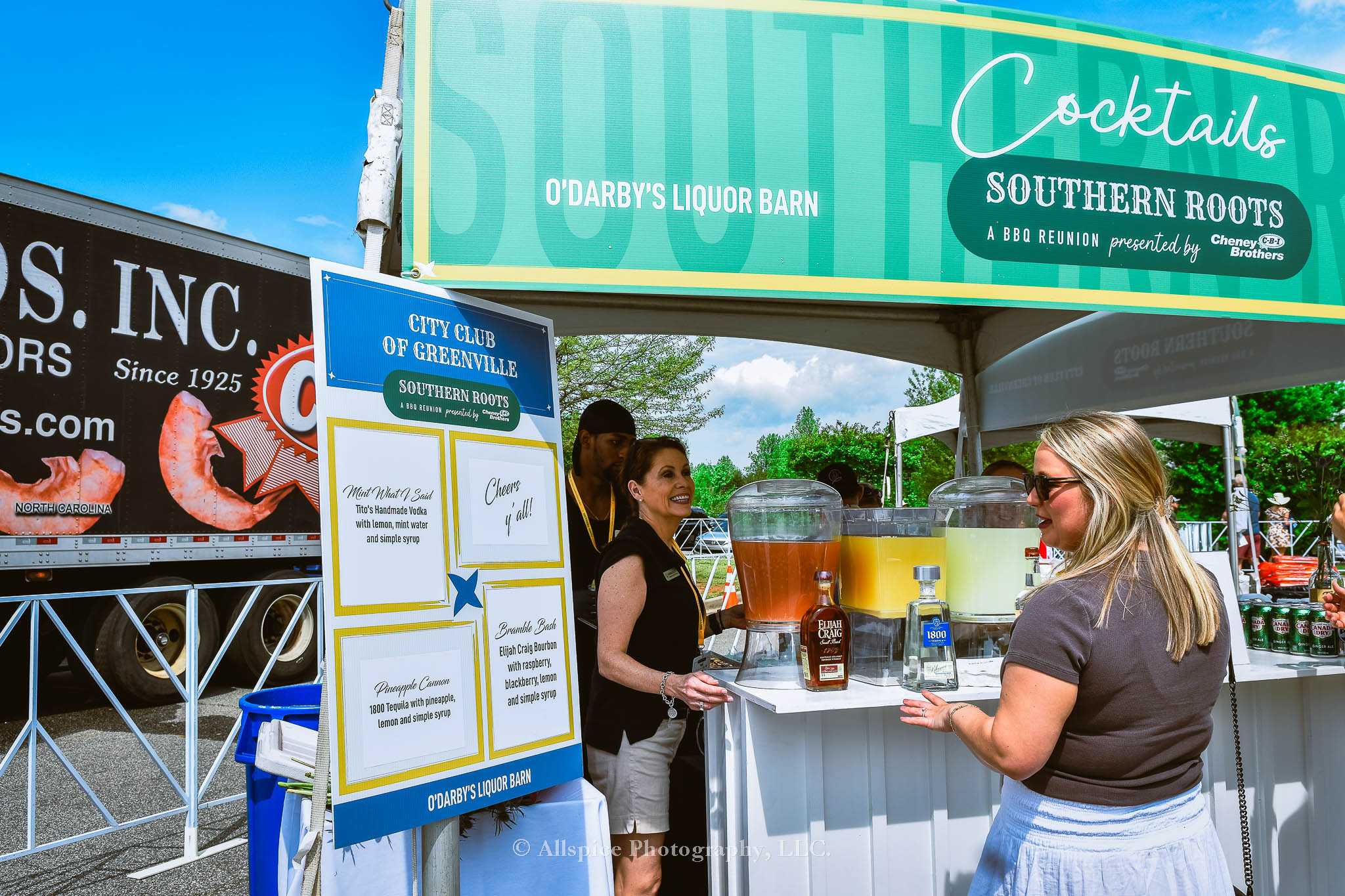 Cannon from @GVLGroupies checking out the VIP Cocktails from the City Club of Greenville at Southern Roots Reunion 2024. Taken by Allspice Photography, LLC.