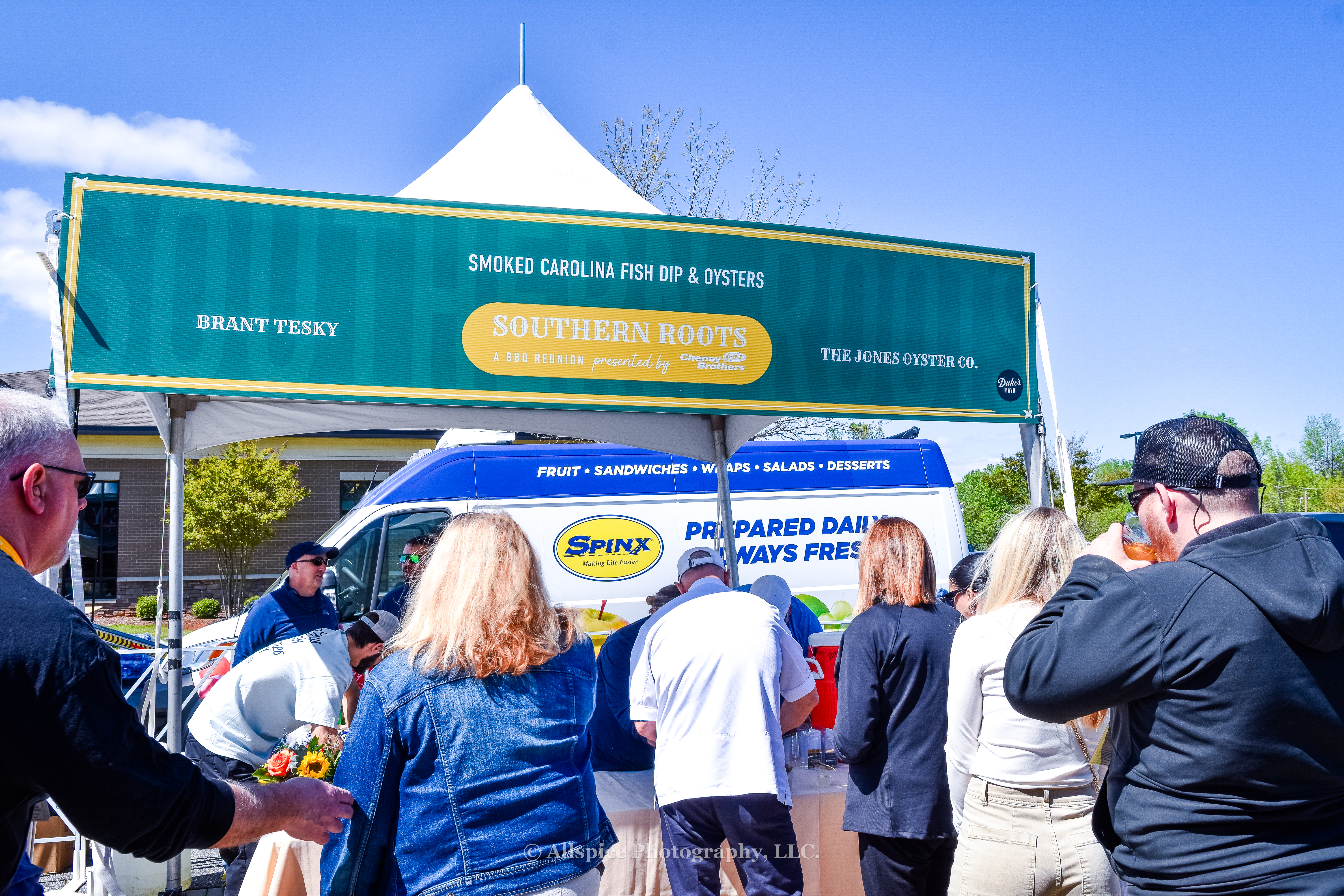 The Jones Oyster Co.'s booth, offering smoked Carolina fish dip and oysters from the VIP area at Southern Roots Reunion in Travelers Rest, SC. Photo by Allspice Photography, LLC.