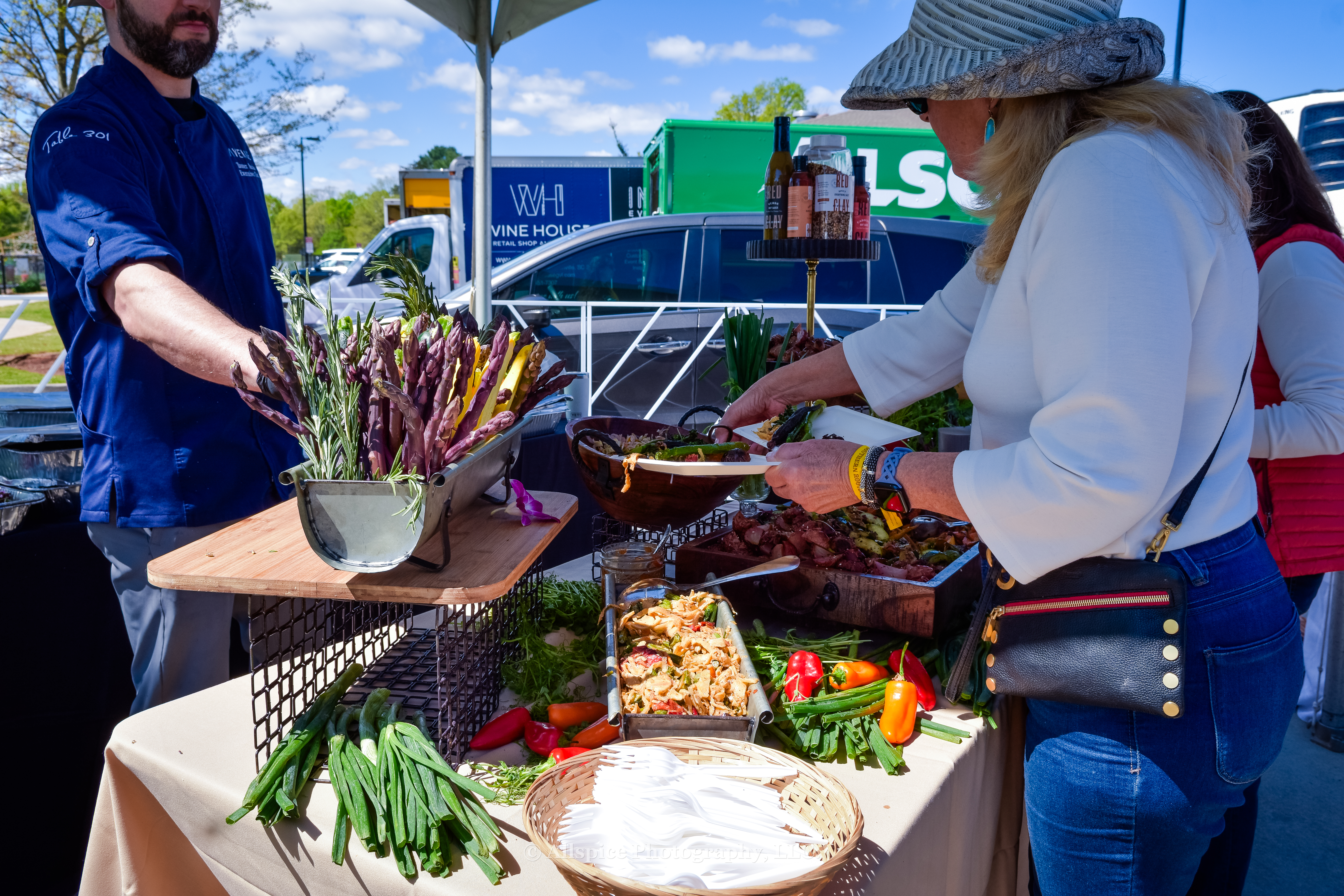 Garden grazing table with fire roasted root vegetables from Chef Tanner Marino and Avenue in the VIP area at Southern Roots Reunion in Travelers Rest, SC. Photo by Allspice Photography, LLC.