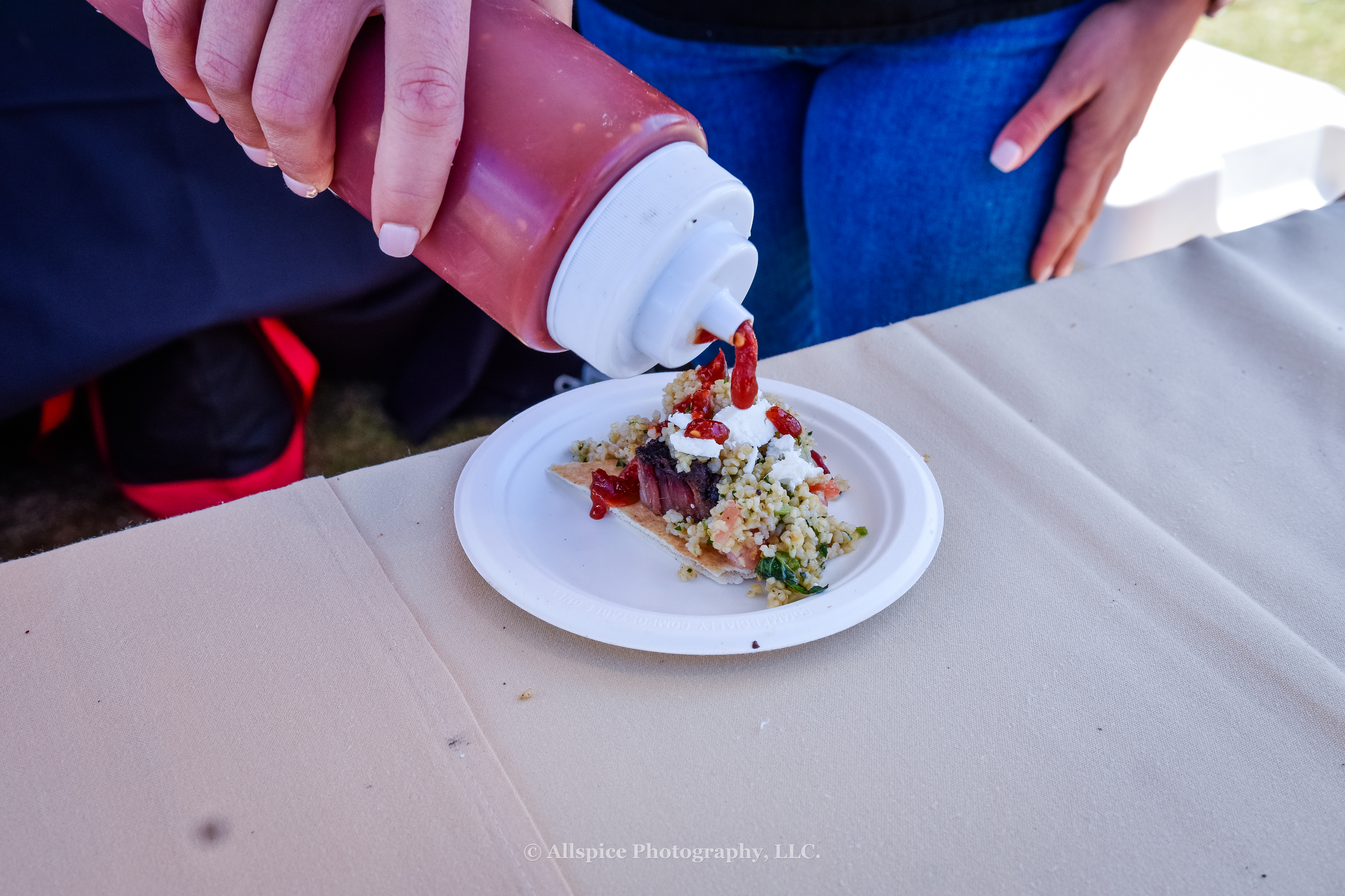 Mediterranean Brisket with Grilled Pita, Tabbouleh, Shards of Feta, And Fermented Red Pepper Sauce from The Cook's Station and Fork Grove BBQ at Southern Roots Reunion in Travelers Rest, SC. Photo by Allspice Photography, LLC.