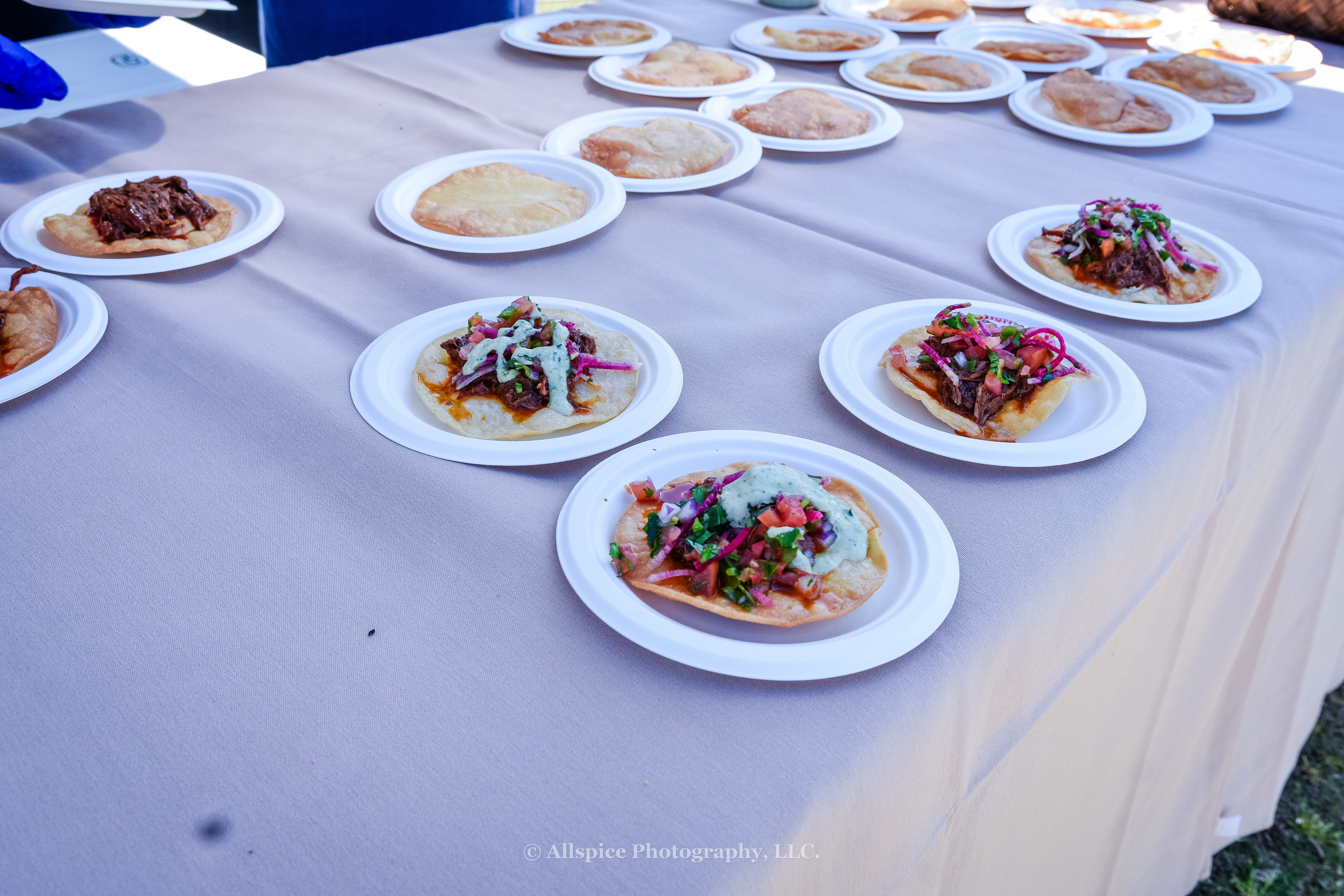Adobo Goat Tostada with Tomatillo Salsa Verde and Fresh Radish Pico from Topsoil Restaurant and Davila's BBQ at Southern Roots Reunion in Travelers Rest, SC. Photo by Allspice Photography, LLC.