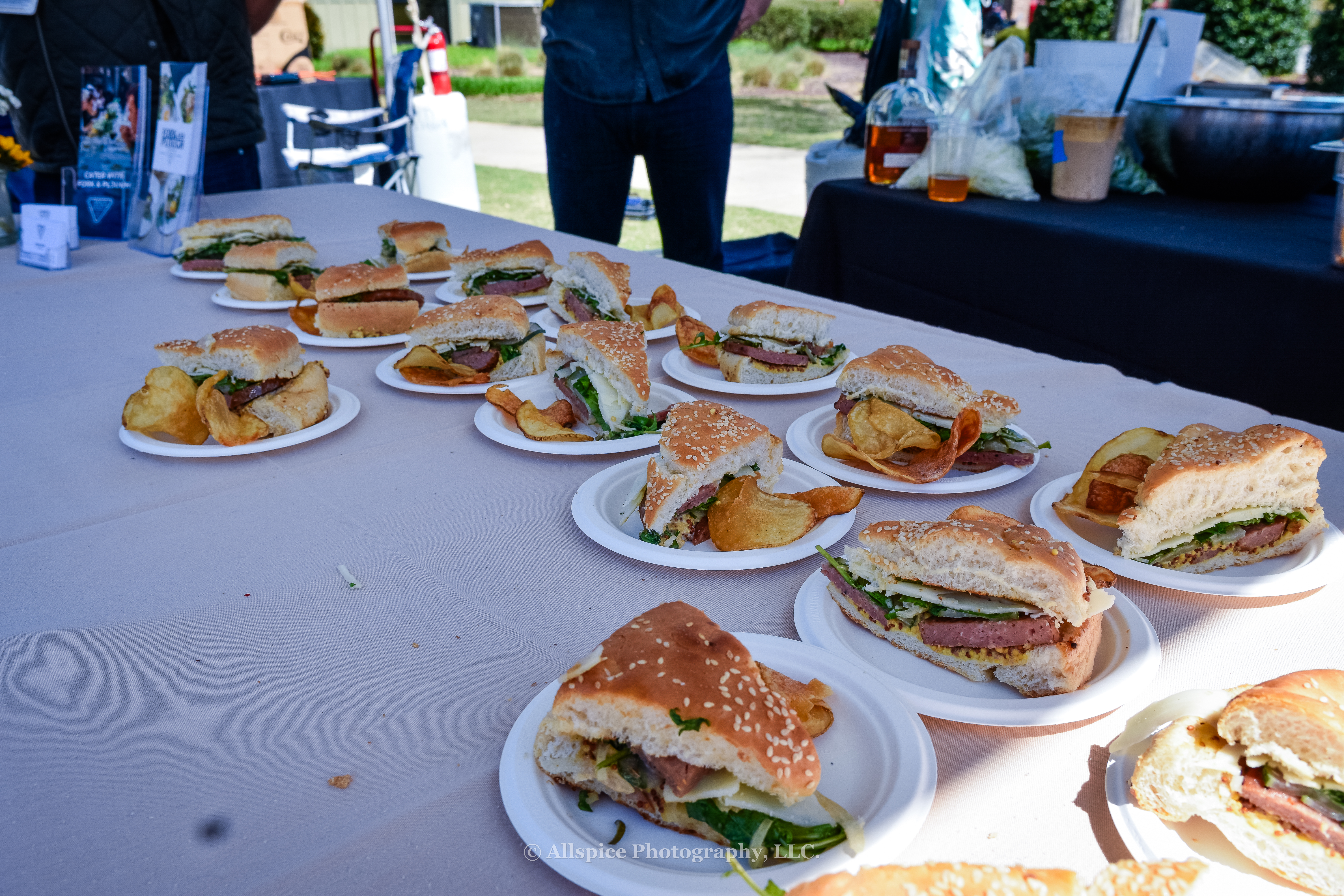 Kochsalami Sandwich With Aged Provolone, Lusty Monk Mustard, House Pickles, and chips from Mama Jean's BBQ and Fork and Plough at Southern Roots Reunion in Travelers Rest, SC. Photo by Allspice Photography, LLC.