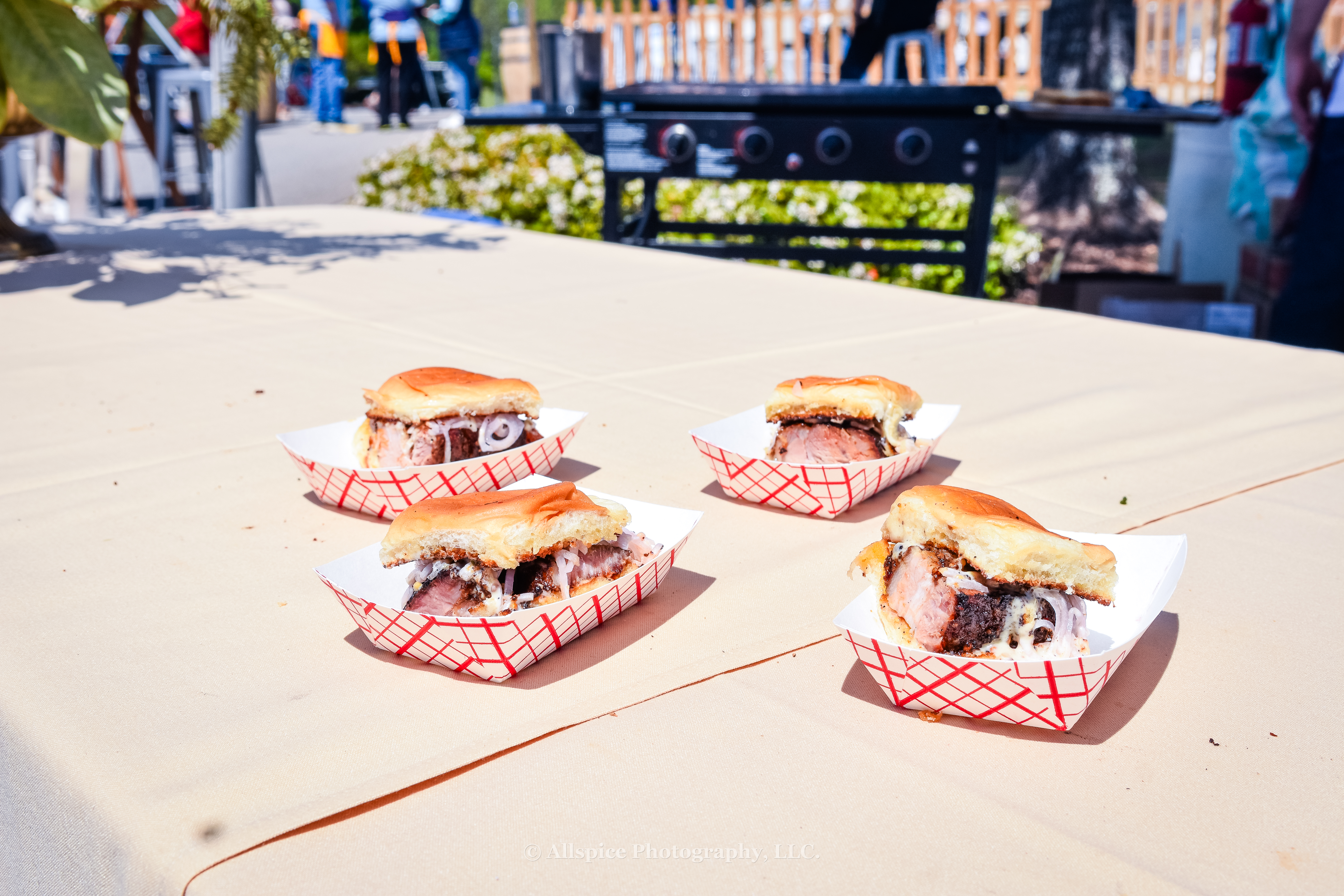 Scoundrel's smoked pork belly slider with black truffle and watercress from the VIP area at Southern Roots Reunion in Travelers Rest, SC. Photo by Allspice Photography, LLC.